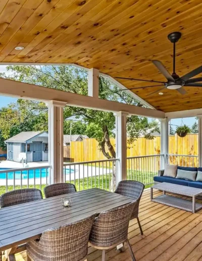rear porch addition with pine ceilings and ceiling fan